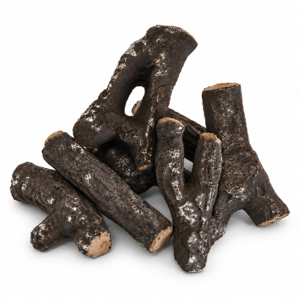 Six Wesley ceramic gas fire logs piled on a white background