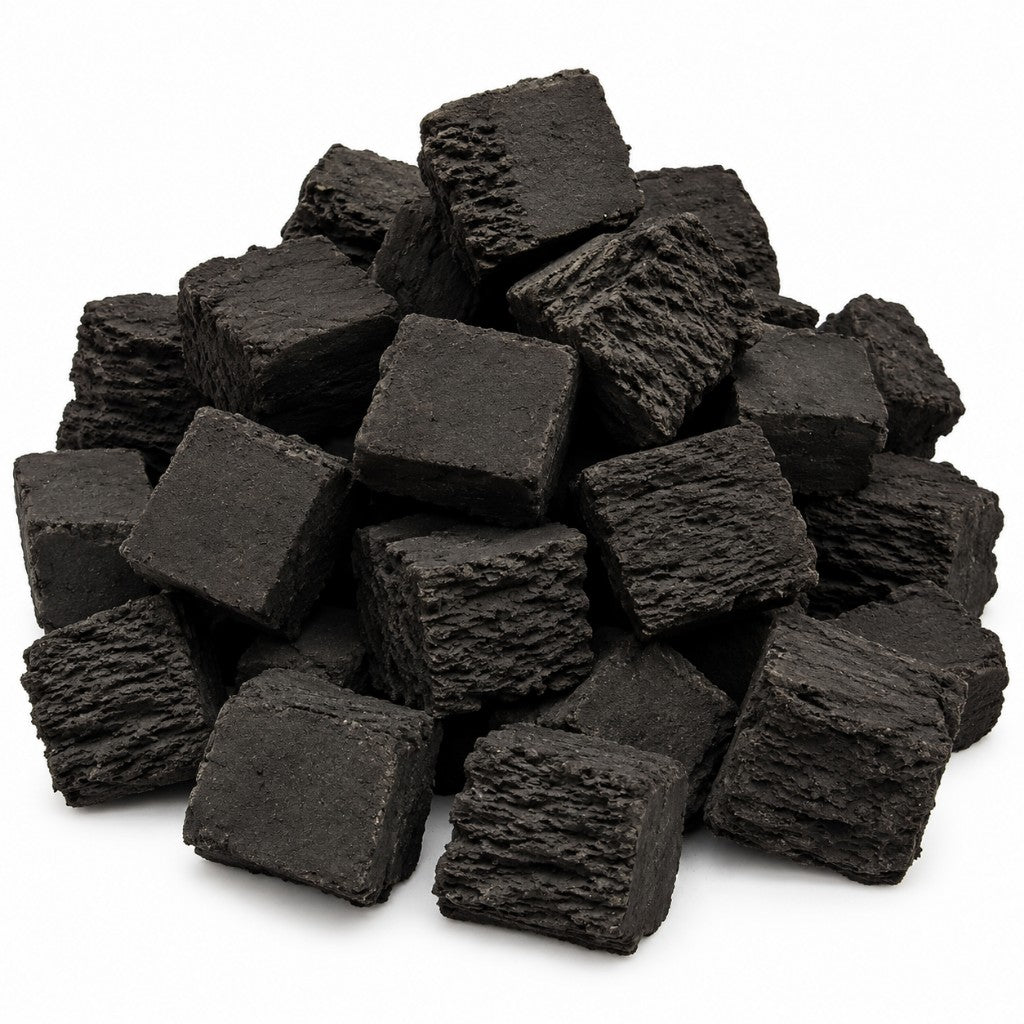 Square ceramic gas fire coals in a pile.