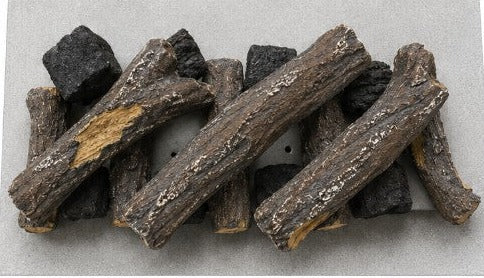 Top layer on the same burner: larger ceramic logs placed across the base layer with gaps for flames
