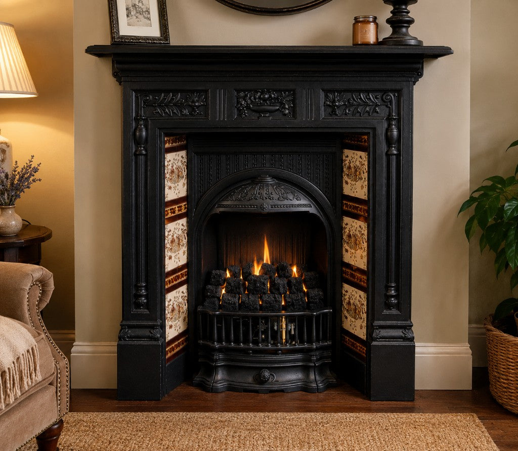 Inset gas fire with ceramic coal effect installed in traditional fireplace